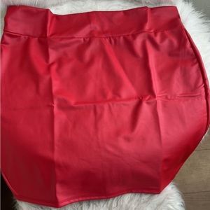 Red faux leather mini skirt.